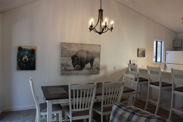 A close-up shot of the white colored wooden Dining Table